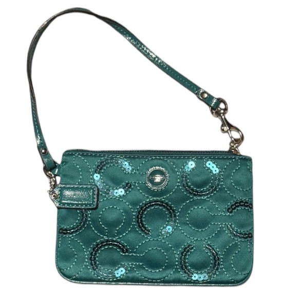 Coach Handbags - Coach Teal Wristlet in signature sequined "C"